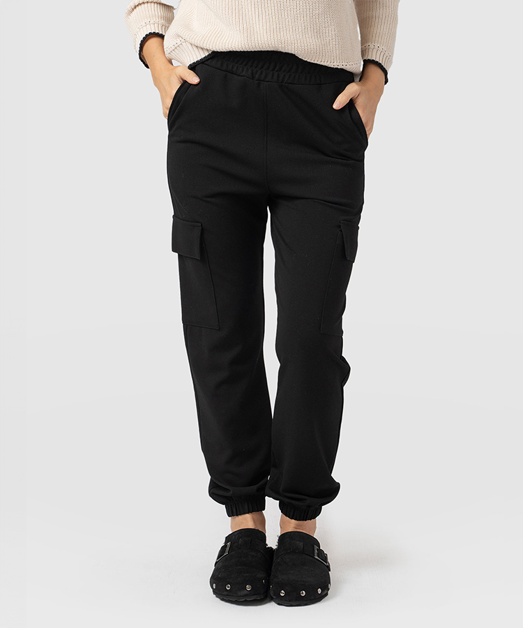 Black jogging bottoms with an elasticated waist, elasticated cuffs, and patch pocket at either leg.