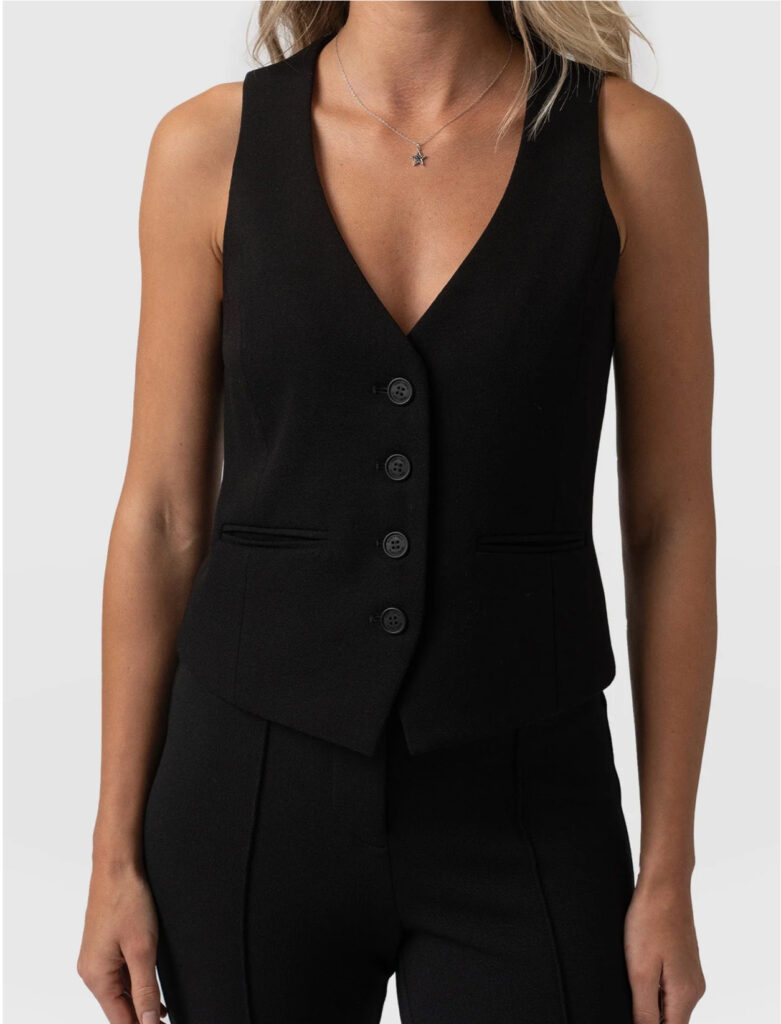 Woman wearing a black waistcoat