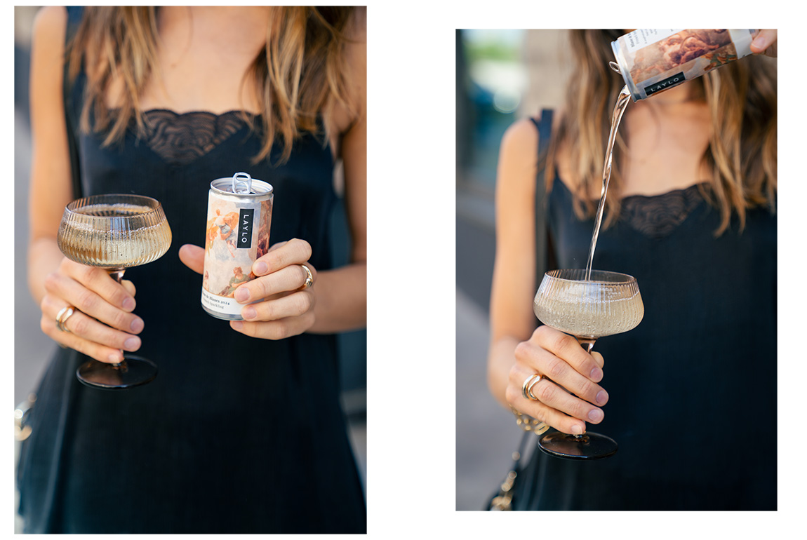 Two images of Laylo wine. The left image is a model wearing a Saint and Sofia floral cami with a glass of wine in one hand and a can of Laylo in the other. The right image is the model pouring the wine into the glass from a height.
