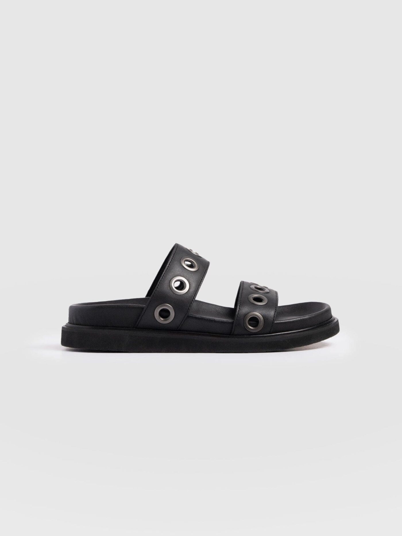The Madison Slides by Saint and Sofia. Double strap leather sliders with metal eyelet details. The perfect summer sandal.