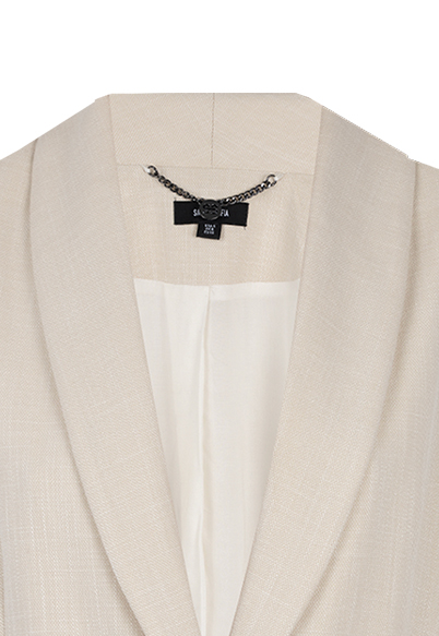 A close up of the Saint + Sofia Astrid blazer where a metal hook has been added to the inside to allow you to hang up your blazer without crinkling or misshaping it.