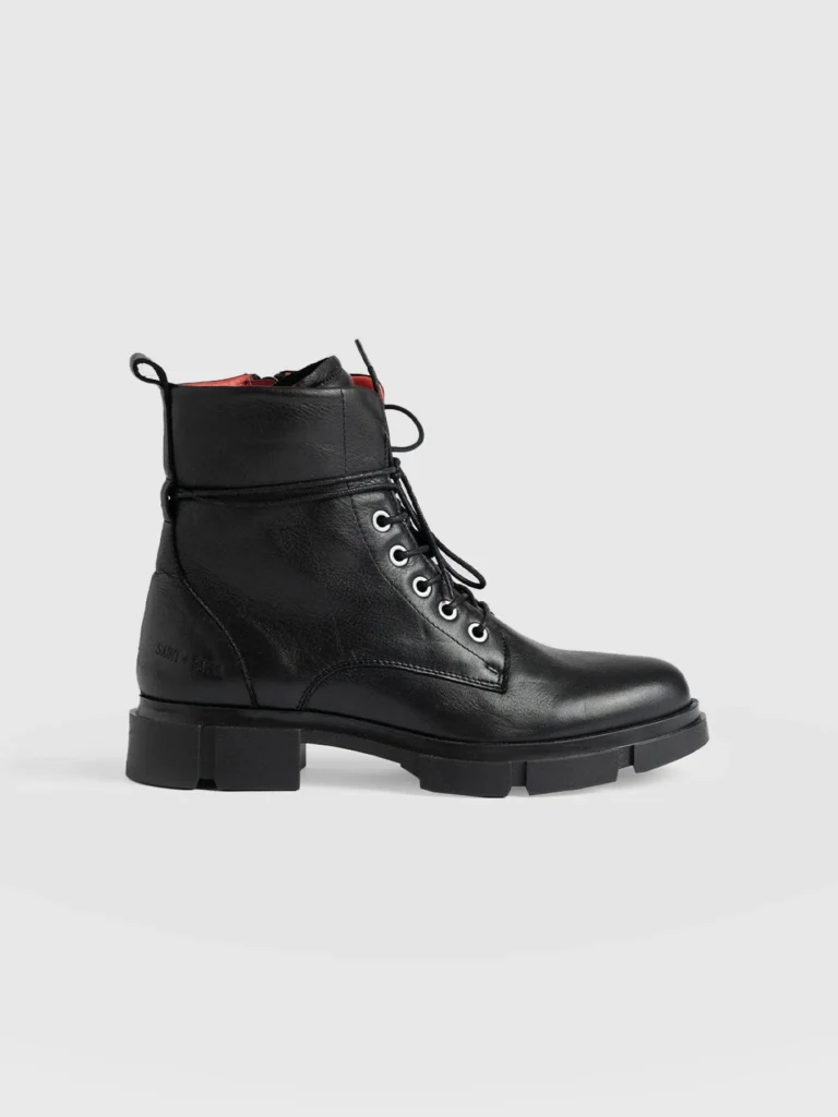The Saint + Sofia Noho boots in black. Leather combat boots with lace up fastening.