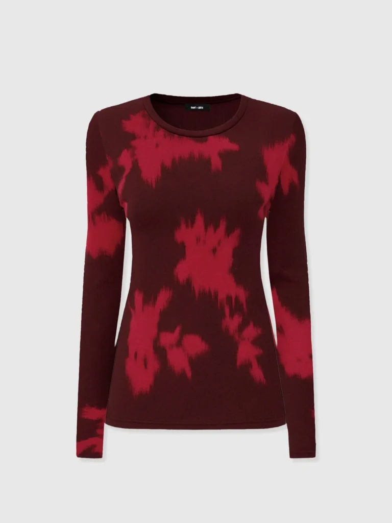 A long sleeved, slim fit, crew neck top with a red floral design from the Saint and Sofia winter collection.