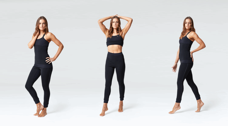 an image of a model standing against a grey background wearing black workout gear. she is repeated three times throughout the image in different poses. the left side of the image shows the model standing with one hand on her hip, the middle shows the model with her hands on her head, and the right shows the model stood to the side with her hand against her waist