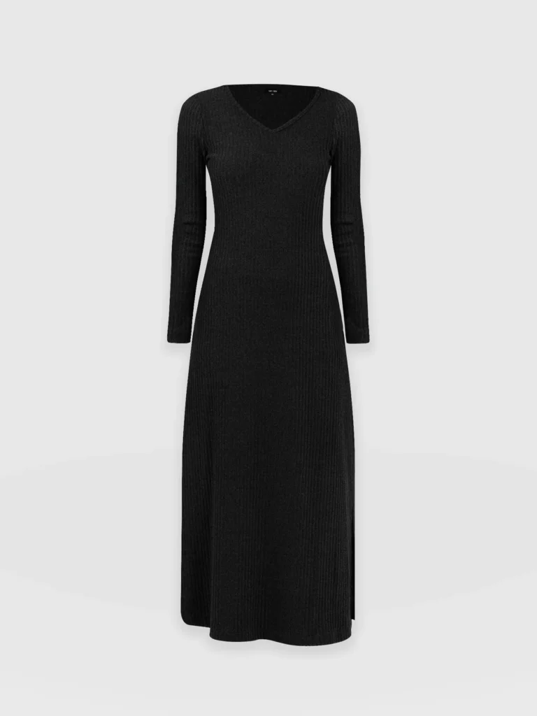 A black knitted dress with a light rib effect, long sleeves, and a soft V neckline