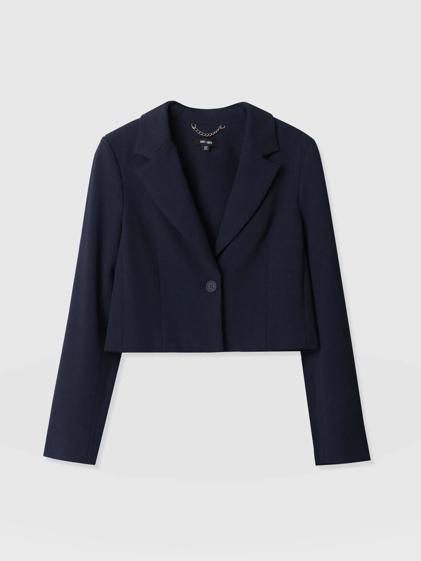A cut out image of the Astrid Cropped Blazer in Navy by Saint and Sofia