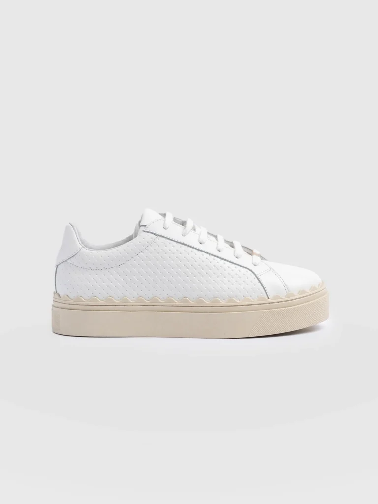 Leather low-top trainers from Saint and Sofia with a platform sole and scallop detail around the trim.