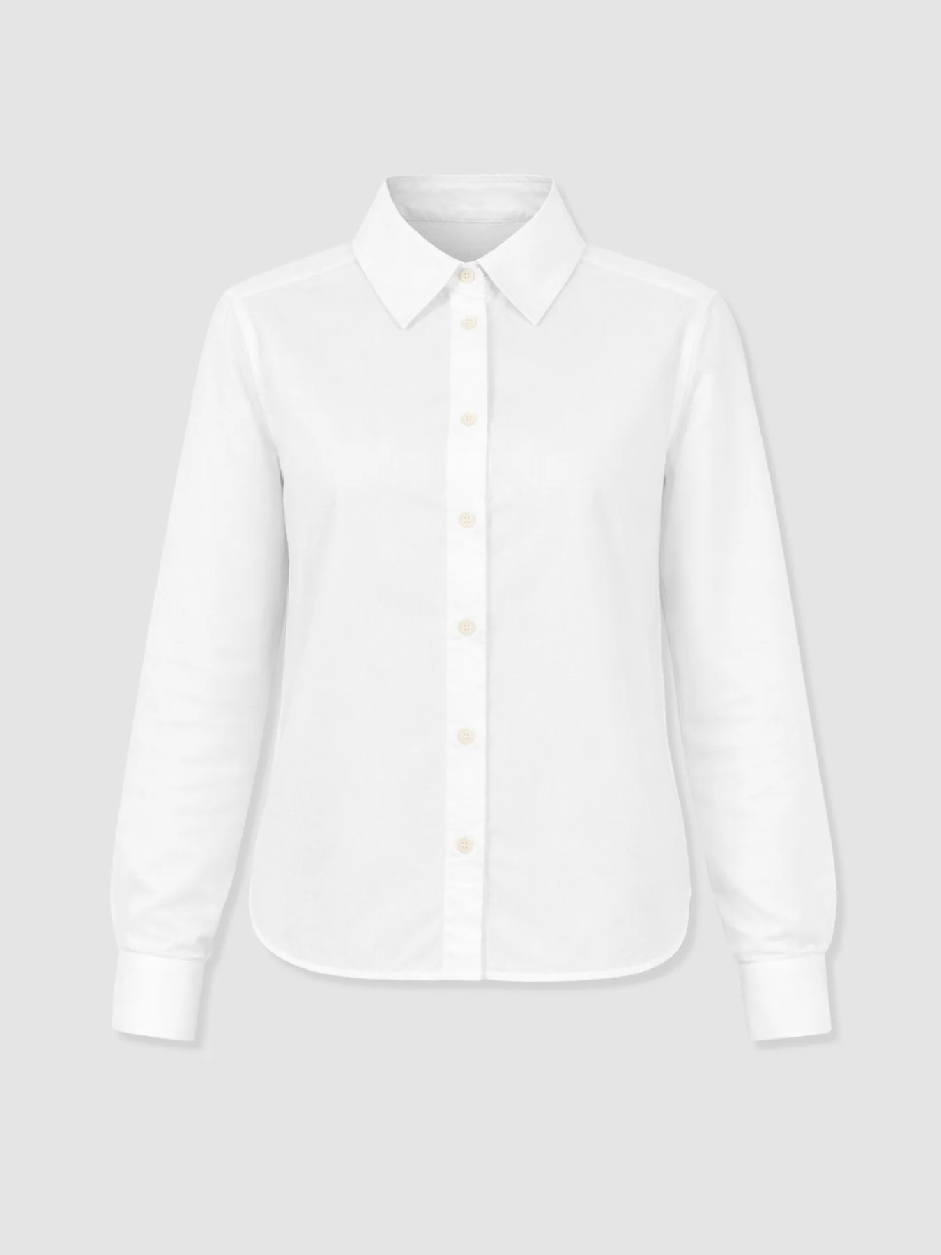 A cut out image of the Anneliese Shirt by Saint and Sofia, a classic white button up shirt made from Oxford Cotton Poplin.