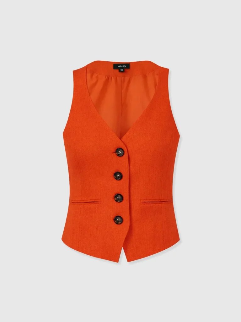The Astrid Waistcoat by Saint and Sofia. A V-neck tailored waistcoat in Burnt orange with horn button detailing.
